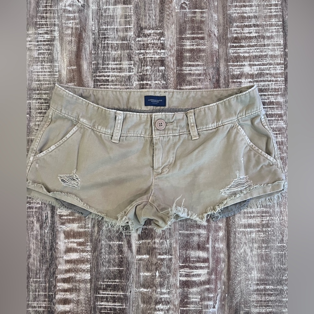 American Eagle distressed tan cut off shorts. Size 2